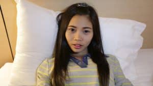 Cute Oriental Teen acting seductively