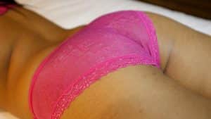 Filipina Teen Slut laying prone with see-through pink panties on