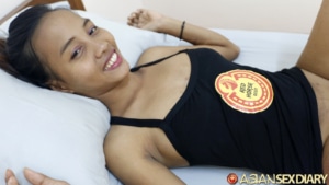 Super pretty skinny Asian MILF with big smile on back