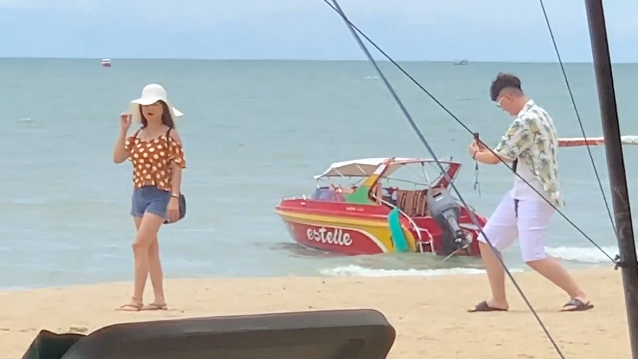 Sexy Girl Getting Photographed on Beach