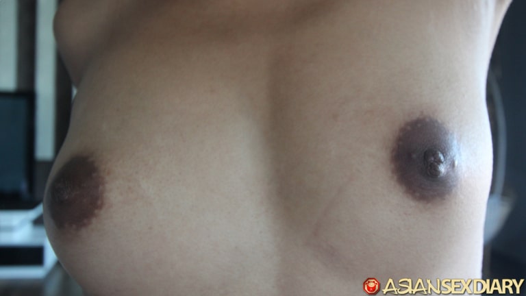 Cute small MILF tits with dark hard nipples