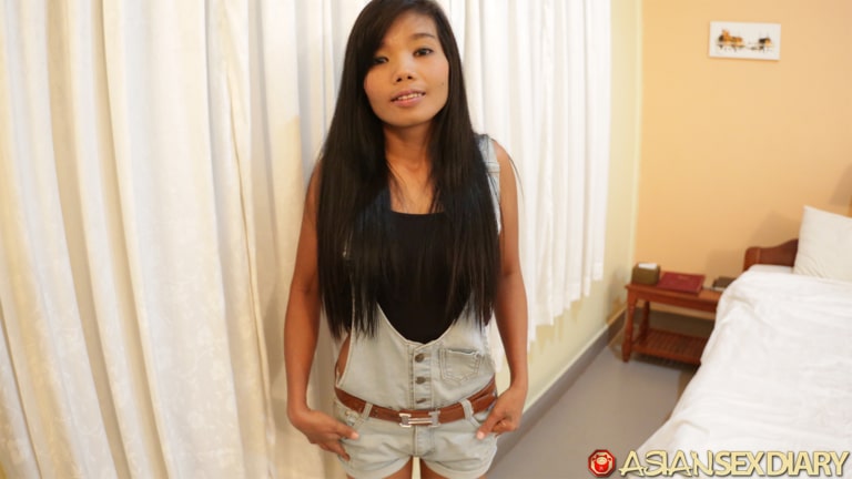 Asian in denim overall shorts