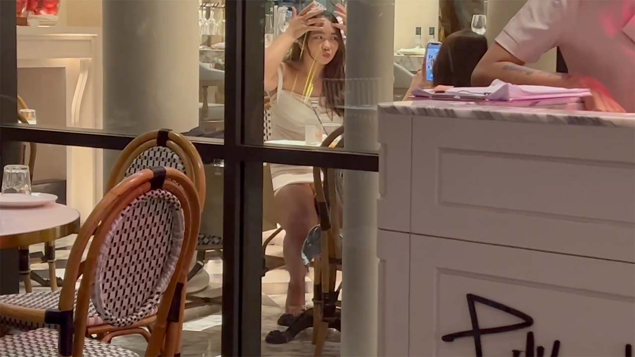 Asian Girl in Short Dress Making Vids