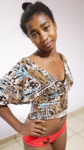 Hot ebony Asian Sex Diary Tatiana strips down to her red panties