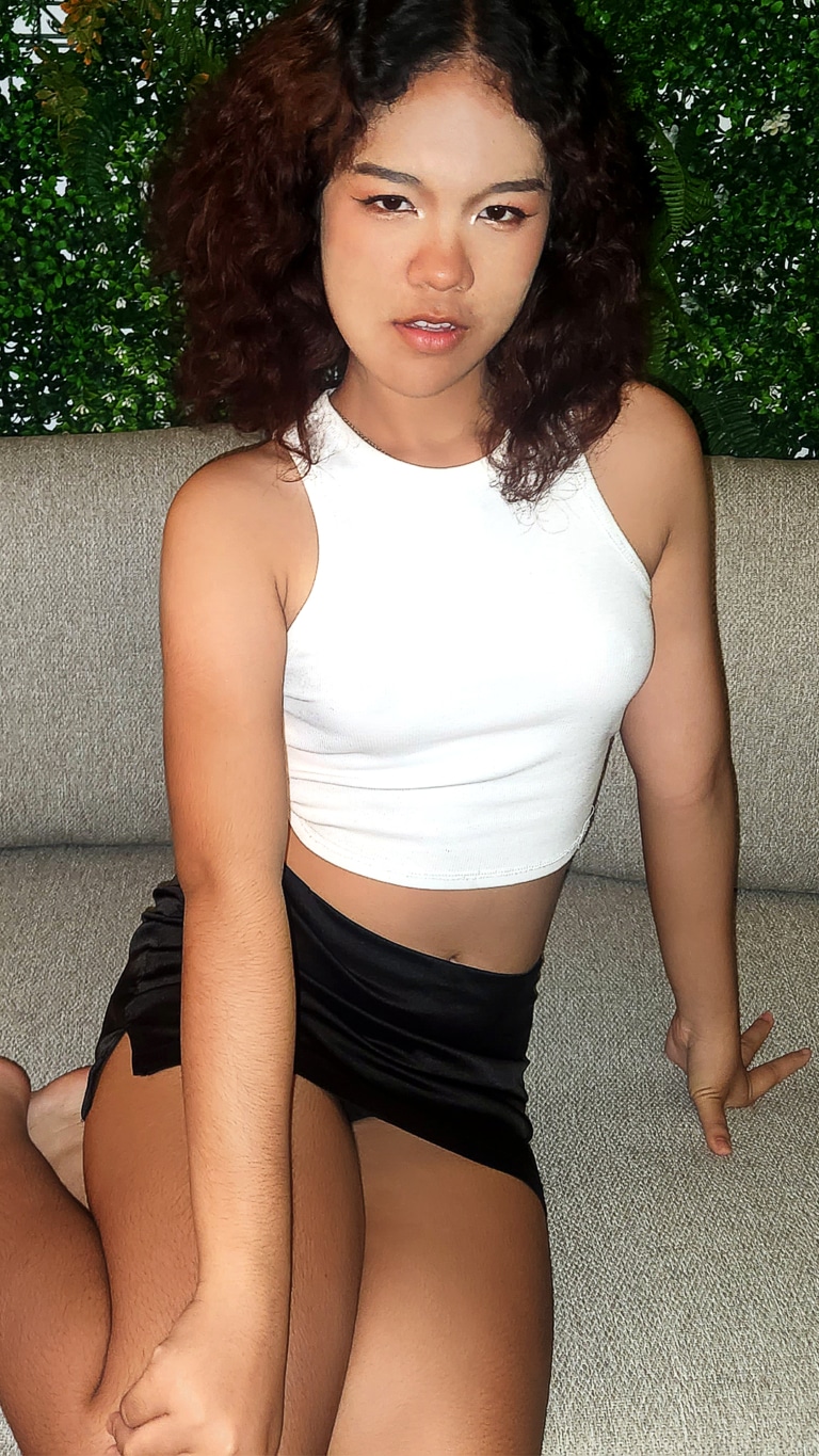 Curly haired Asian Sex Diary Sara B in short skirt