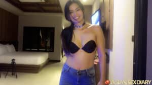Posing in bra and jeans