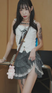 Skinny Taiwan adult actress Ai Yan lifting skirt